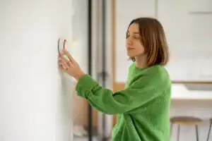 rsz woman controlling temperature with a smart thermos 2023 11 27 05 10 09 utc 300x200 1